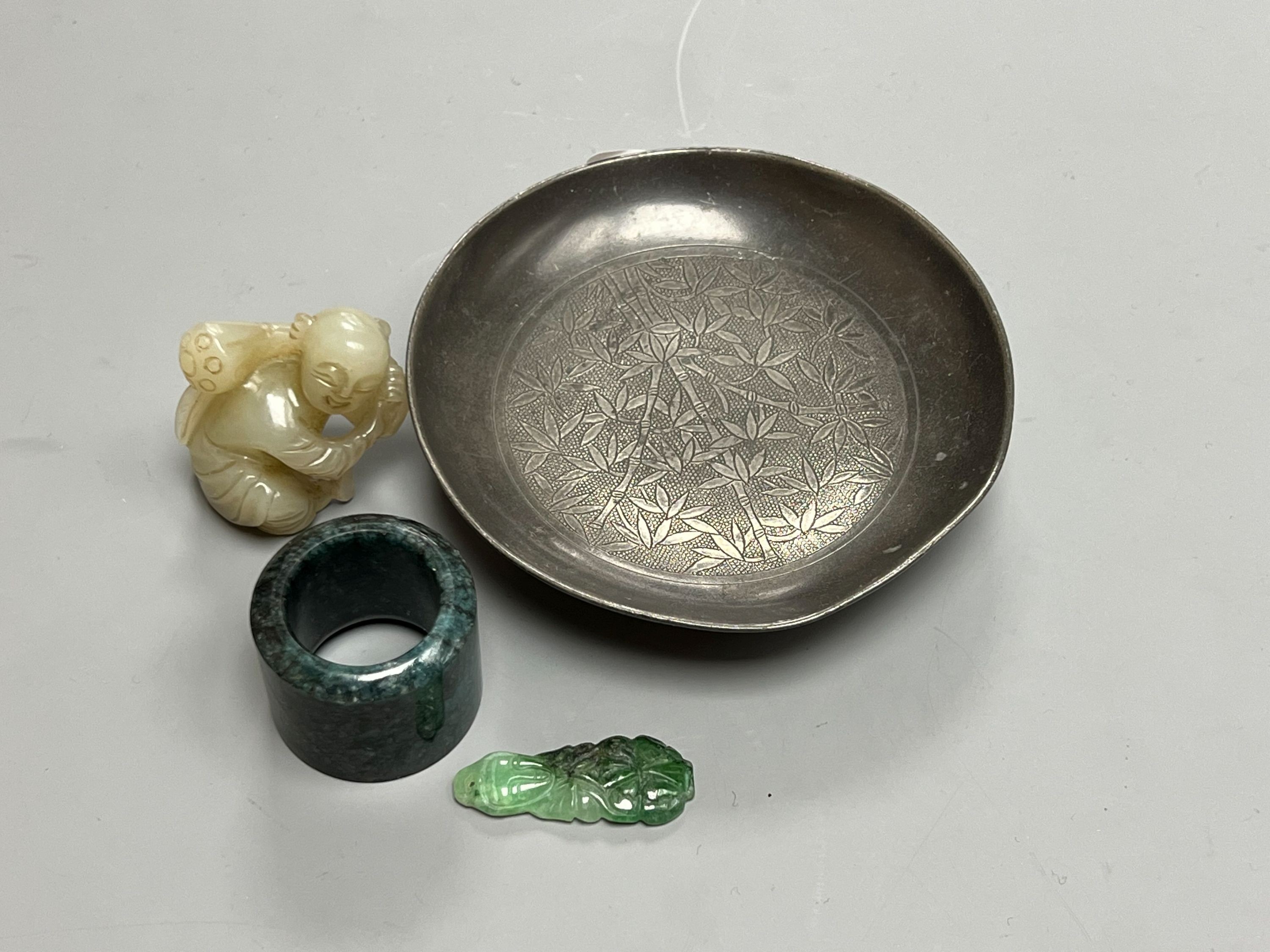 Assorted Chinese items including a jade figure, a jadeite pendant, pewter dish etc.